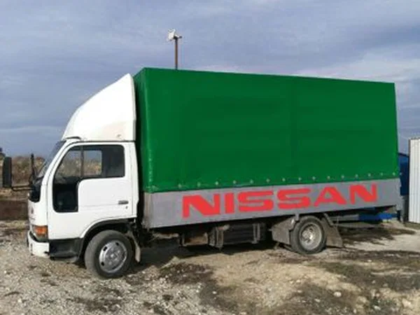 Тентованный автомобиль Nissan Atlas FD42