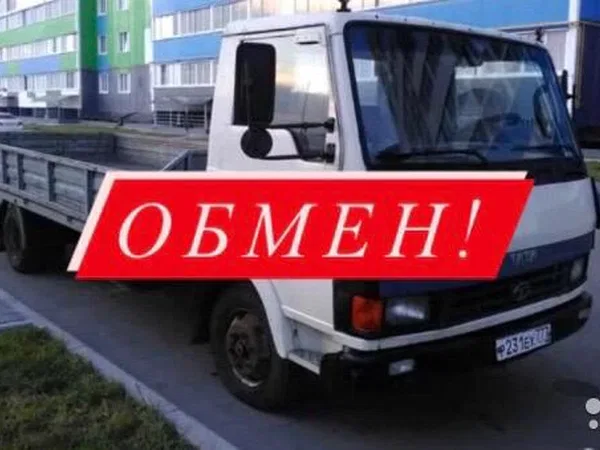 Бортовой автомобиль TATA