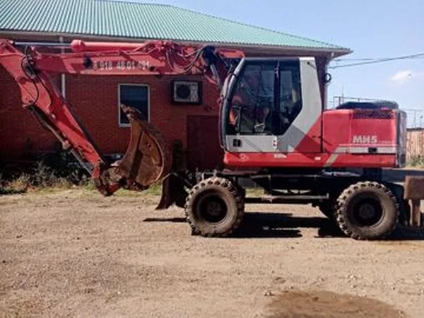 Колесный экскаватор O&K (Orenstein & Koppel) MH 5 compact