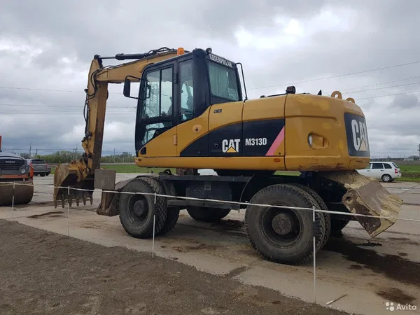 Колесный экскаватор Caterpillar M313D