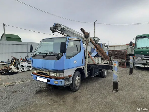Бурильно-крановая машина Aichi D502 на шасси Mitsubishi Fuso Canter