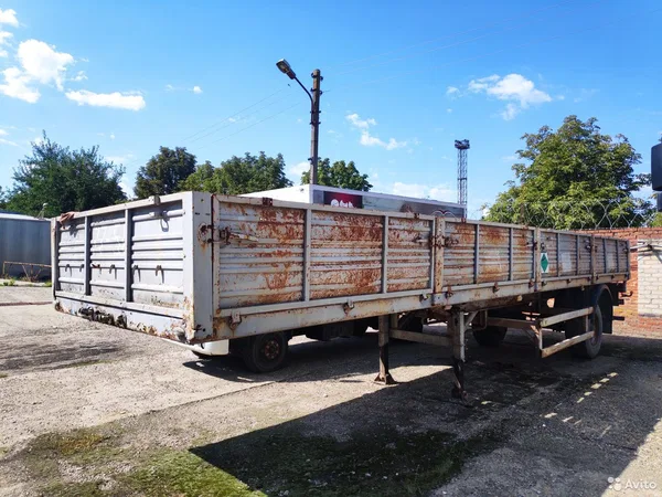 Бортовой полуприцеп МАЗ 93802