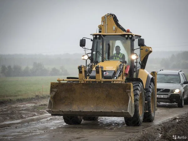 Экскаватор-погрузчик Caterpillar 434