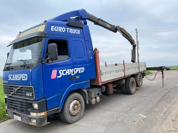 Бортовой грузовик с КМУ Volvo FH12