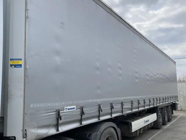 Тентованный полуприцеп Krone