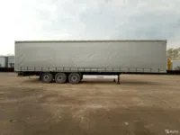 Тентованный полуприцеп Krone