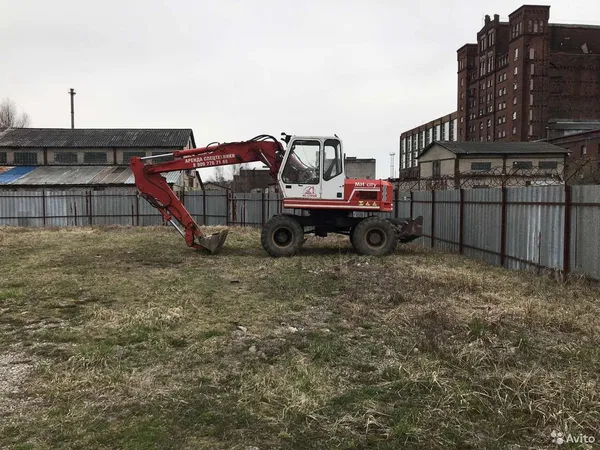 Колесный экскаватор O&K MH city