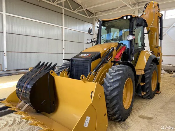Экскаватор-погрузчик Caterpillar 444