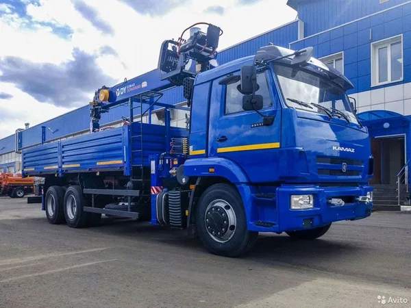 Бортовой грузовик с КМУ КамАЗ 65117 с КМУ DongYang SS1956