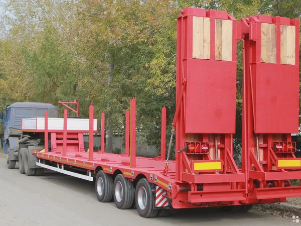 Полуприцеп тяжеловоз низкорамный 3-хосный