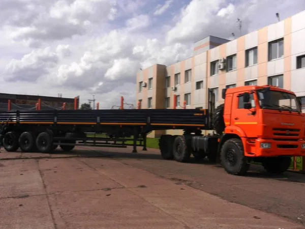 Бортовой полуприцеп AMKAR (АвтоМастер) 9406-13