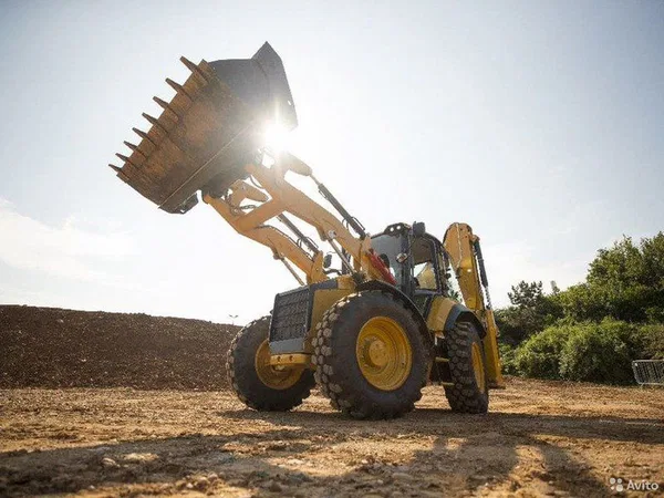Экскаватор-погрузчик Caterpillar 444