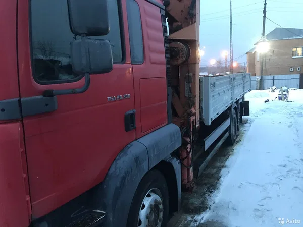 Бортовой грузовик с КМУ MAN TGA