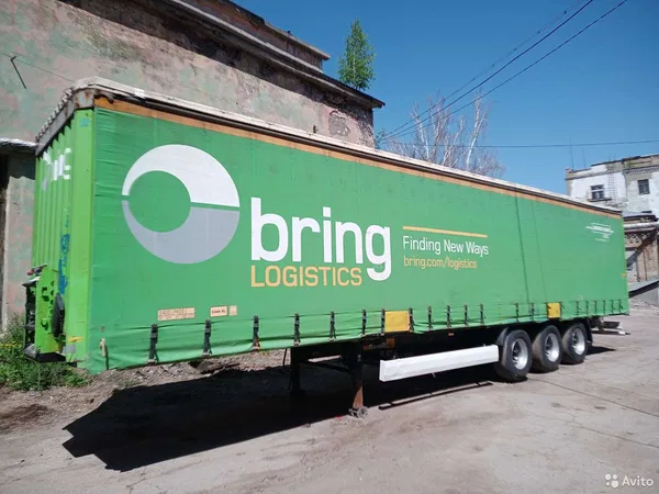 Тентованный полуприцеп Krone