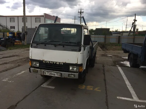 Бортовой автомобиль Mitsubishi Canter