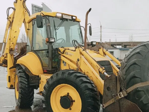 Экскаватор-погрузчик New holland