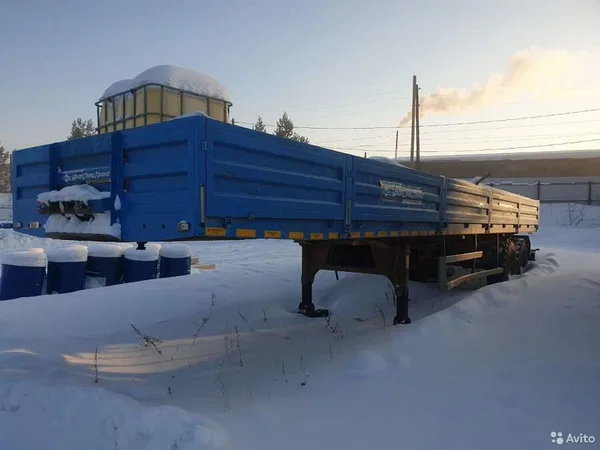 Бортовой полуприцеп УралСпецТранс 94651L