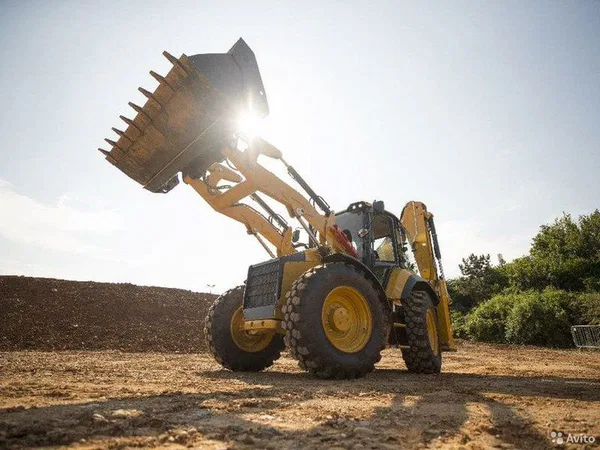 Экскаватор-погрузчик Caterpillar 444