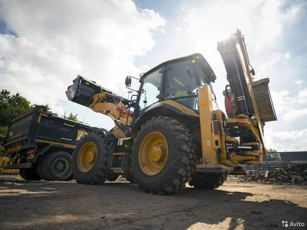 Экскаватор-погрузчик Caterpillar 444