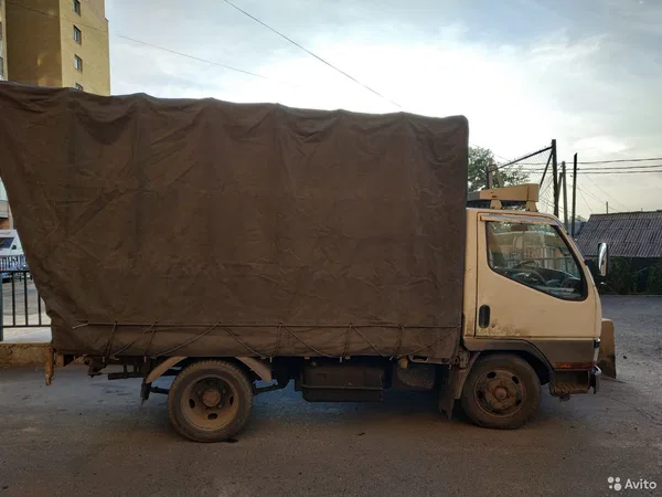 Тентованный автомобиль Mitsubisi Fuso Canter TF