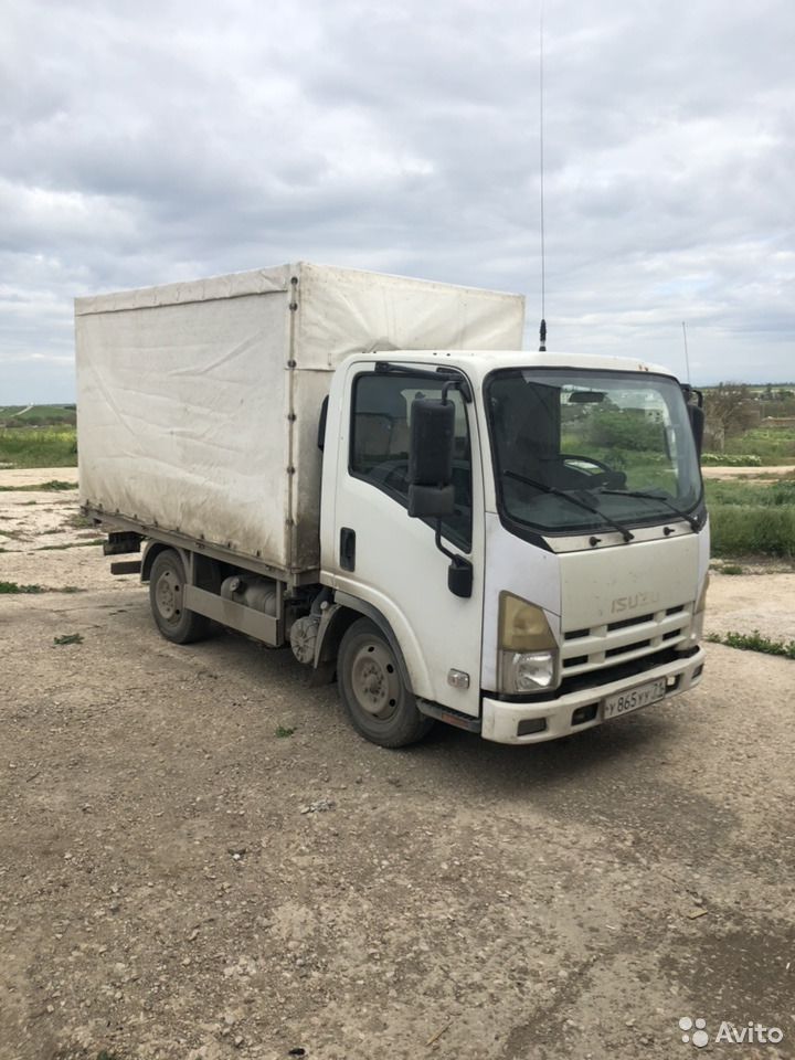 Тентованный автомобиль Isuzu