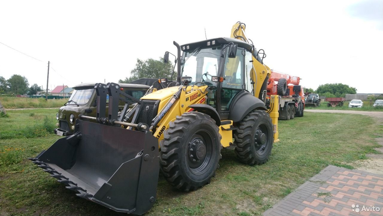 Экскаватор-погрузчик New Holland B115B