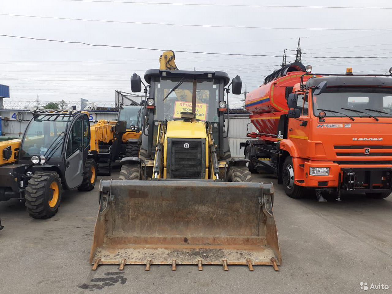 Экскаватор-погрузчик New Holland B80B