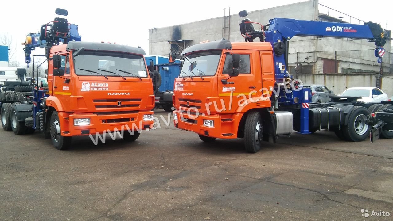 Седельный тягач Камаз 65115 с КМУ
