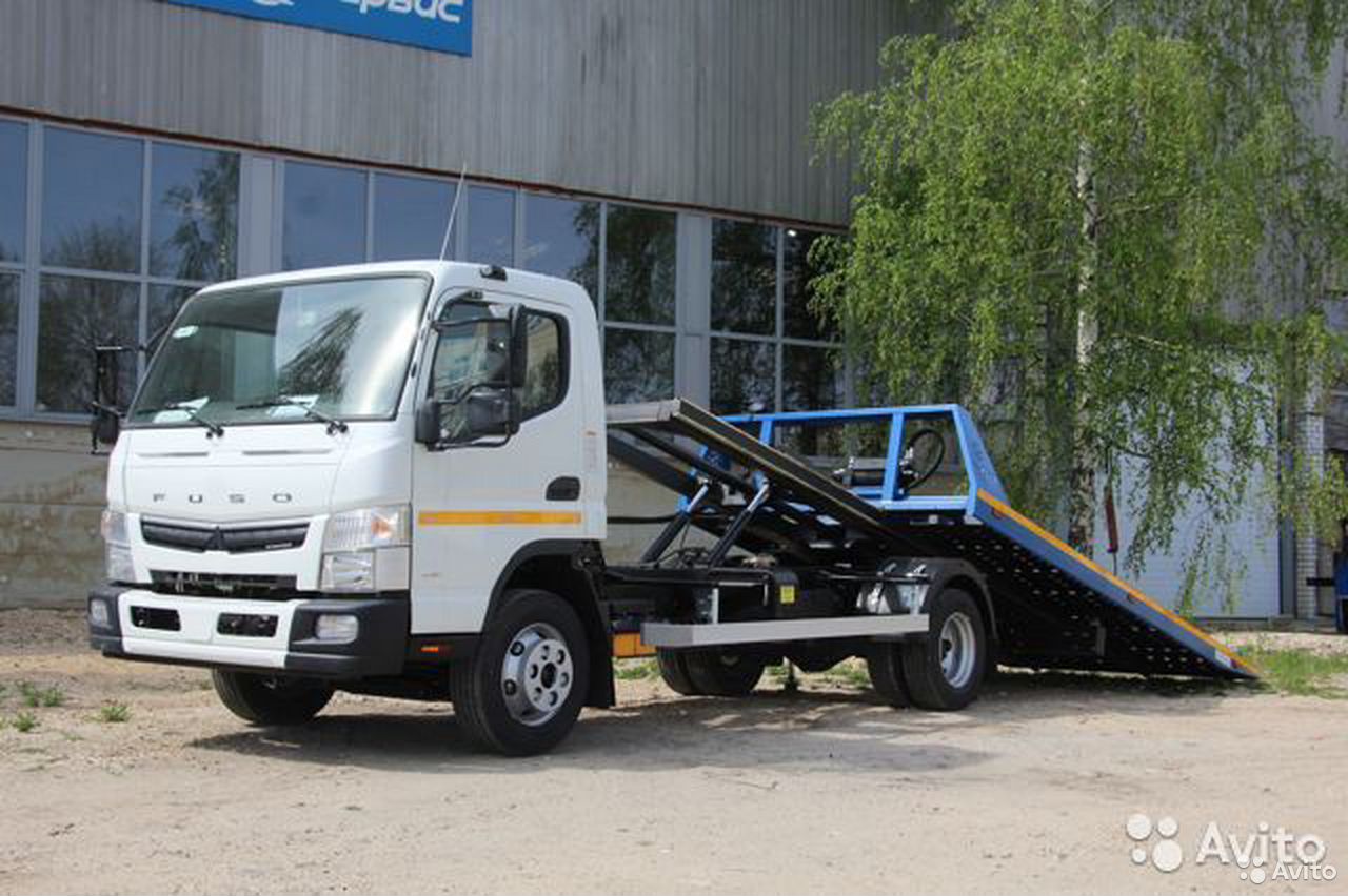 Эвакуатор Mitsubishi Fuso со сдвижной платформой