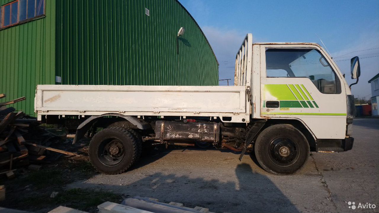 Бортовой автомобиль Mitsubishi Fuso Canter