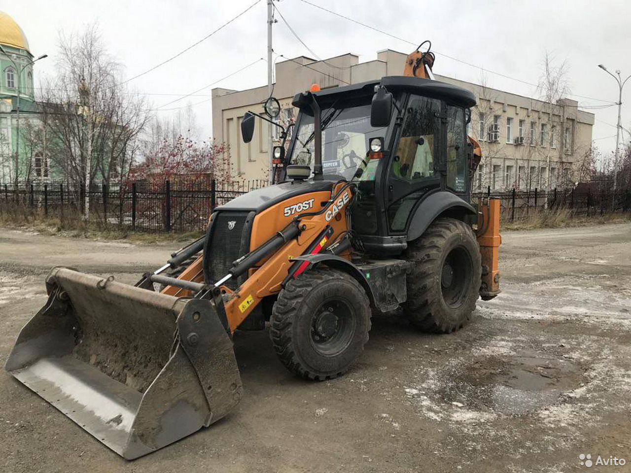 Экскаватор-погрузчик Case 570ST