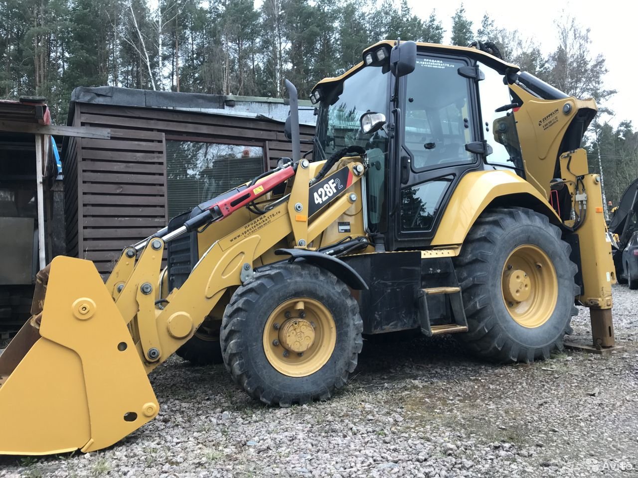 Экскаватор-погрузчик Caterpillar 428F2