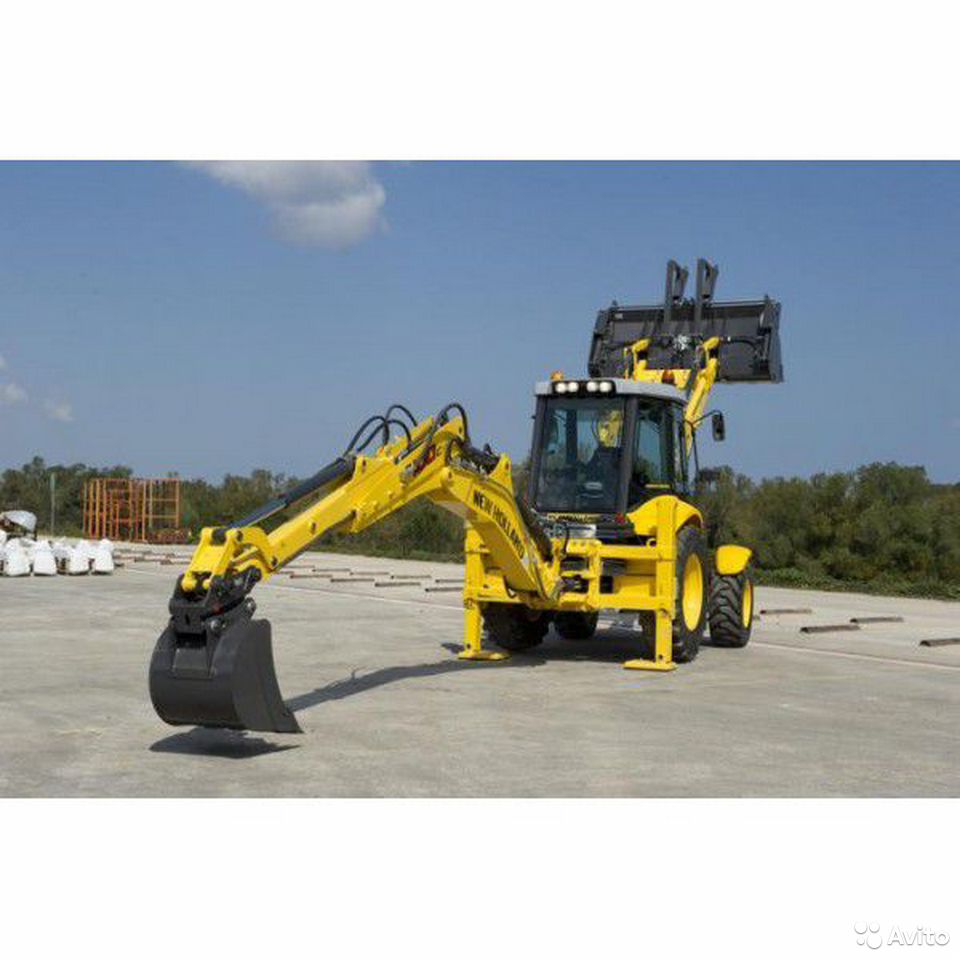 Экскаватор-погрузчик New Holland B100 с гидробуром