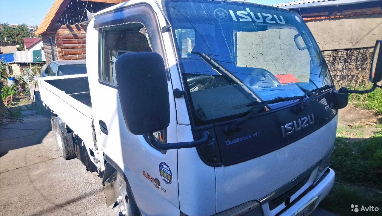 Бортовой автомобиль Isuzu ELF