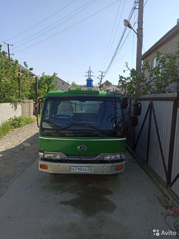 Бортовой грузовик с КМУ Nissan Diesel