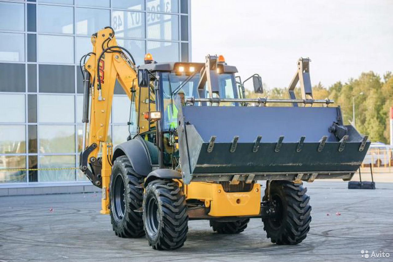 Экскаватор-погрузчик New Holland B100B