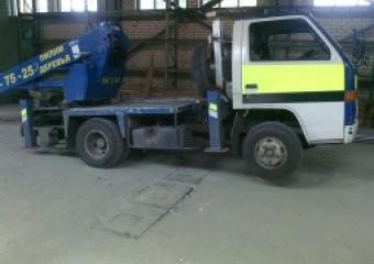 Автовышка ISUZU Elf с АГП Hinowa Orchidea Lift 21.11