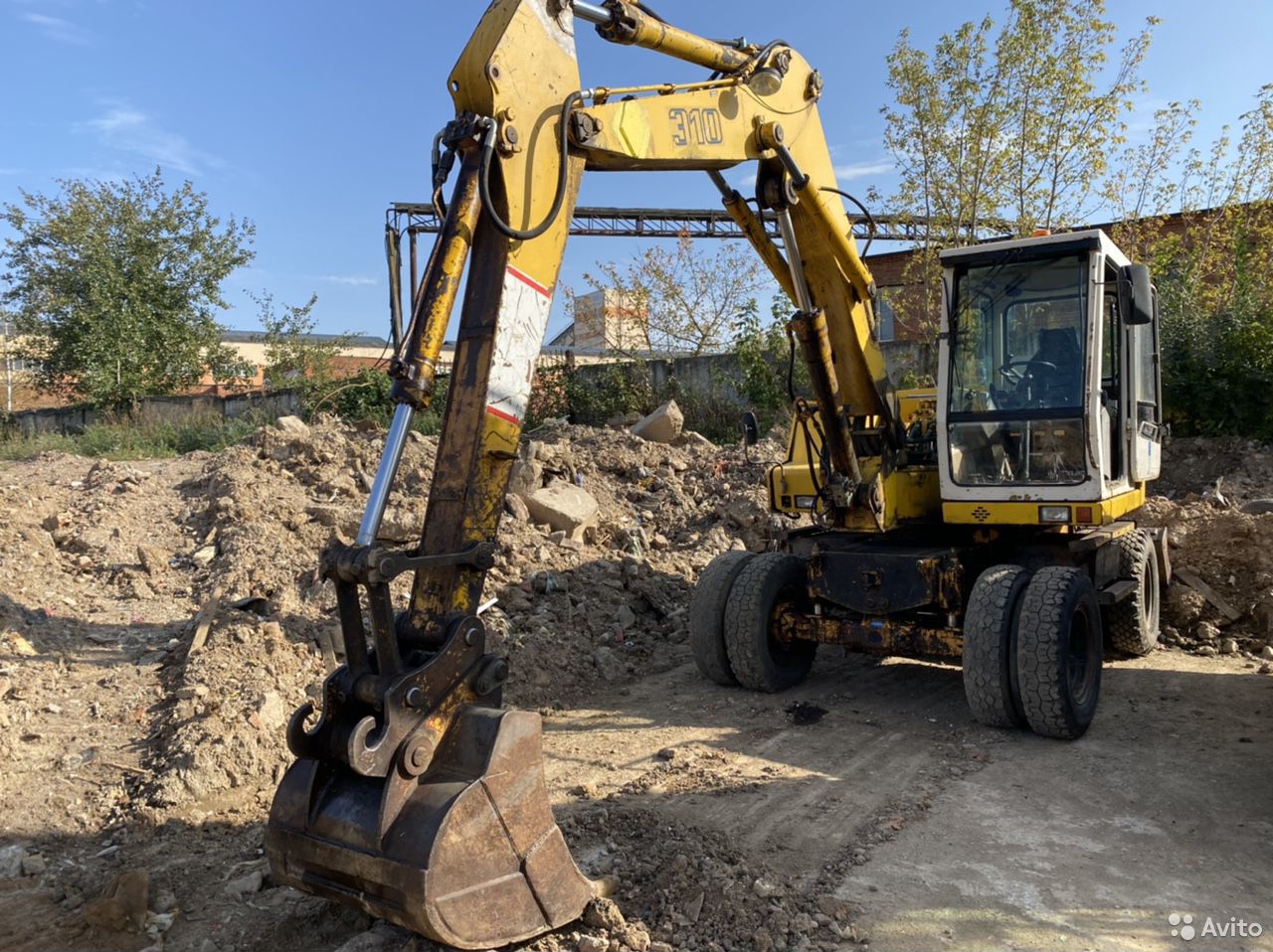 Колесный экскаватор Liebherr 310
