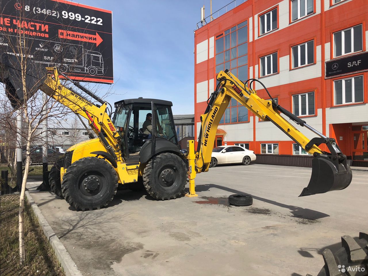 Экскаватор-погрузчик New Holland B115B