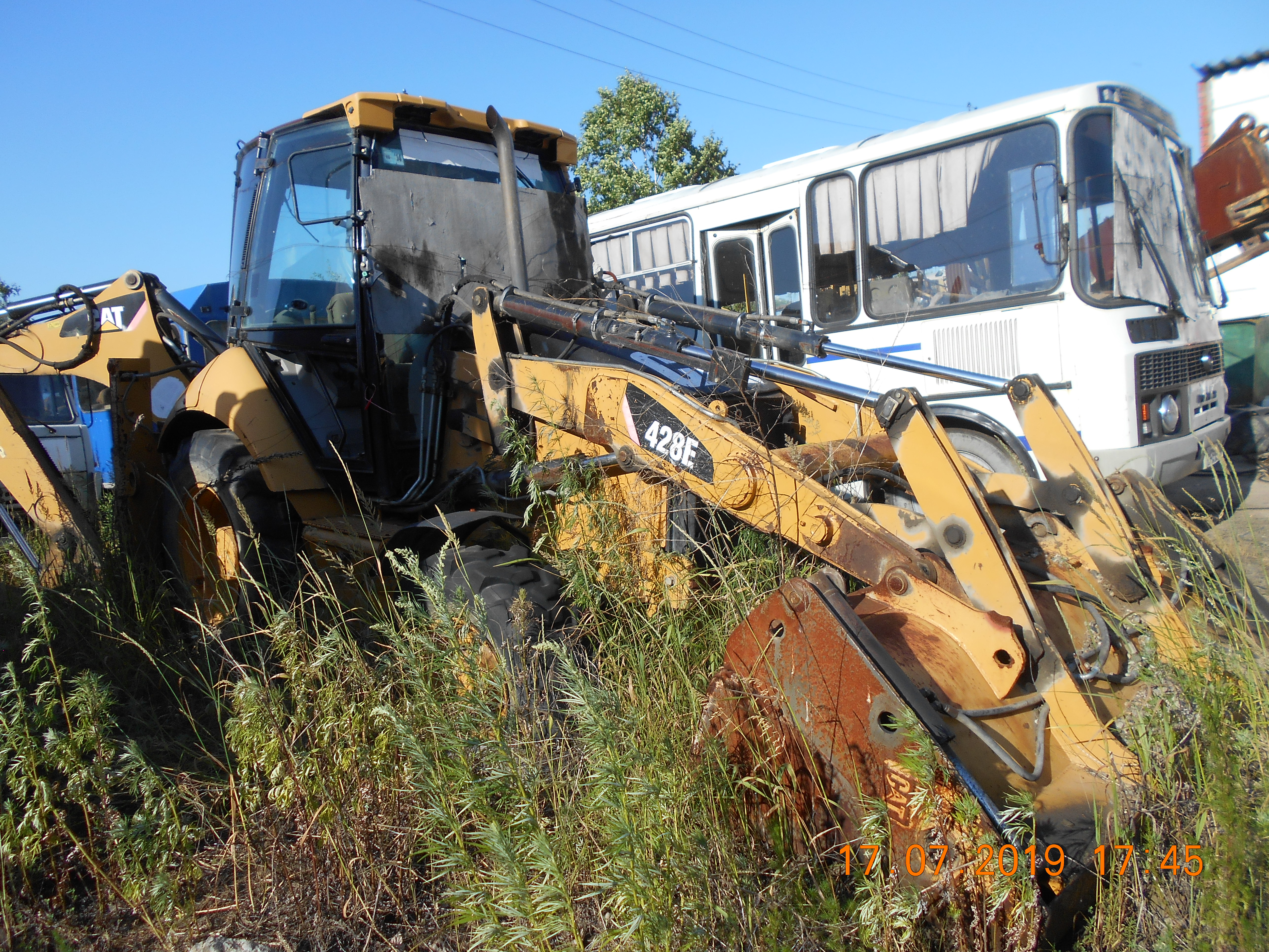 Экскаватор-погрузчик Caterpillar 428E