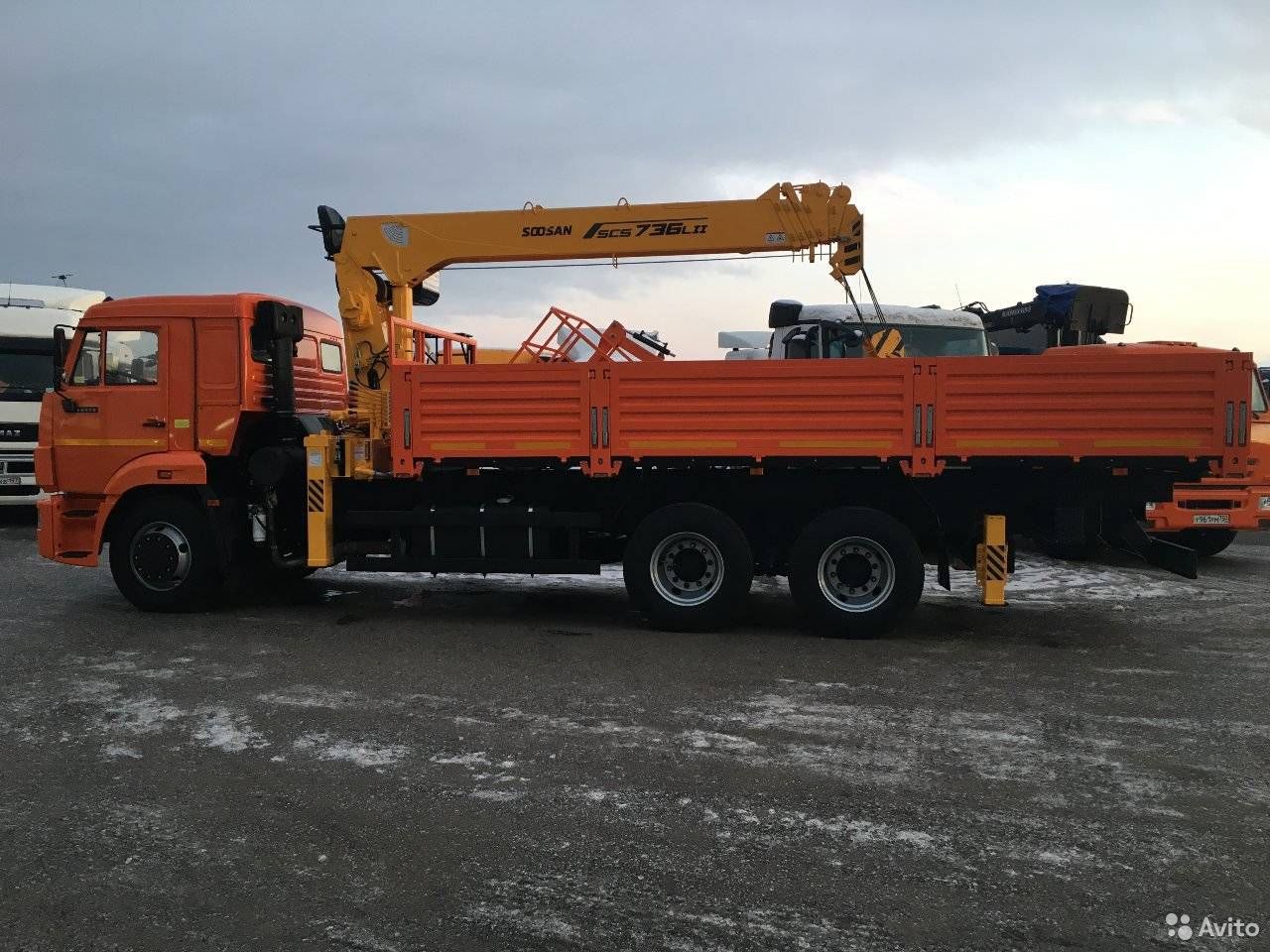 Бортовой грузовик с КМУ КамАЗ 65117-3010-50 с КМУ Soosan SCS736LI