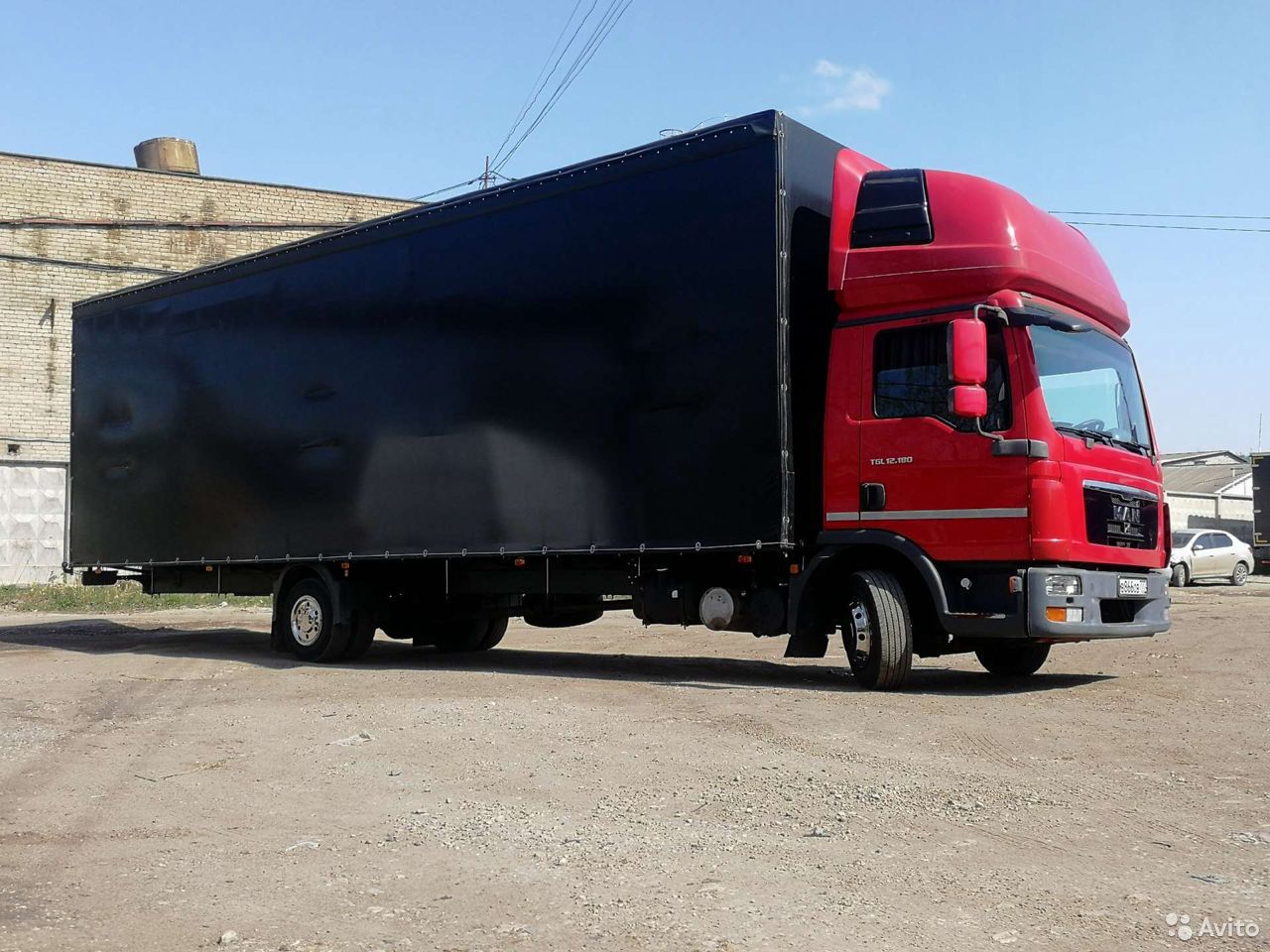 Тентованный грузовик MAN TGL 12.180