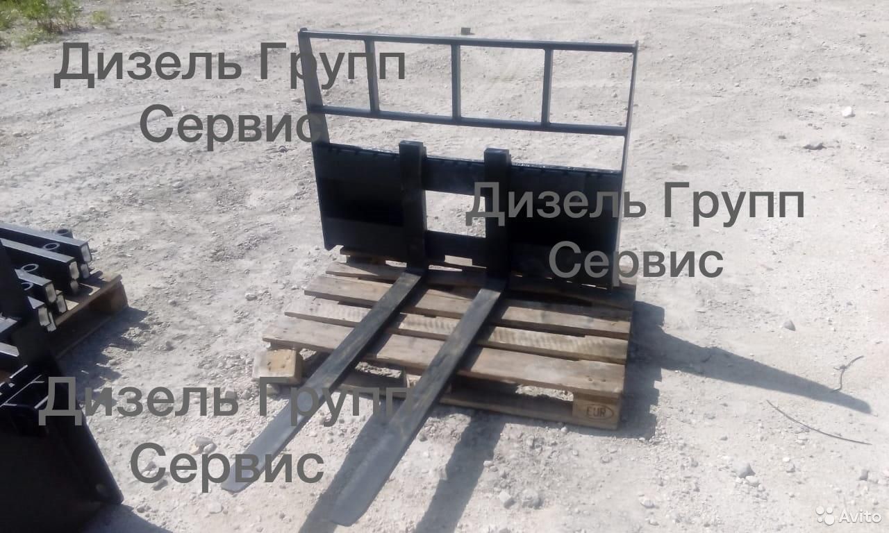 Паллетные вилы на экскаватор-погрузчик