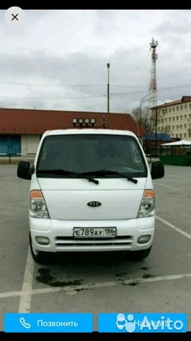 Тентованный автомобиль KIA Bongo