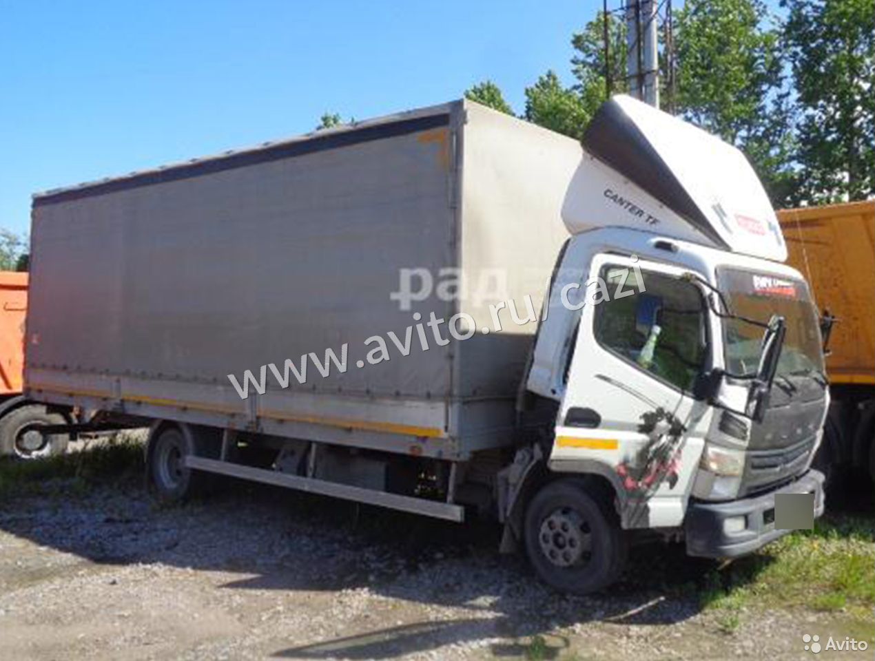 Тентованный автомобиль Mitsubishi Fuso Canter