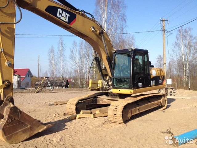 Гусеничный экскаватор Caterpillar 320 DL