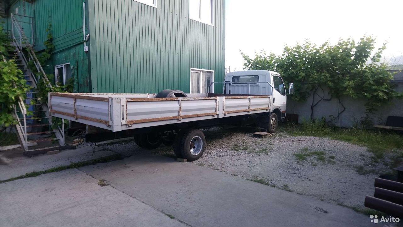 Бортовой автомобиль Mitsubishi Fuso Canter