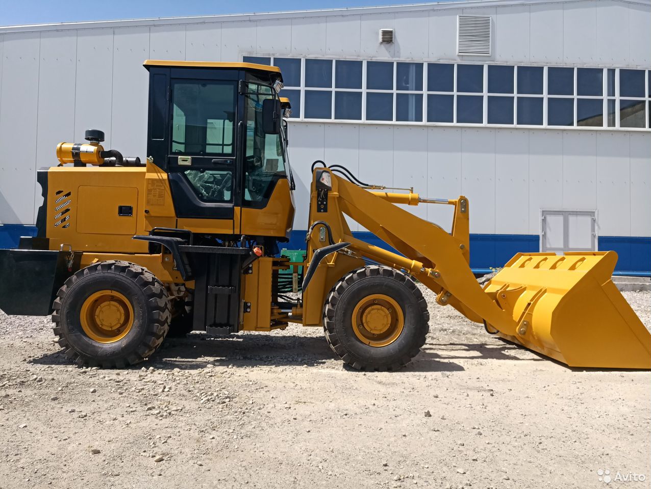 Фронтальный погрузчик Front Loader