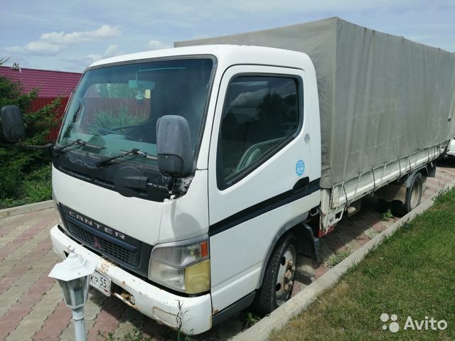 Тентованный автомобиль Mitsubishi Fuso Canter