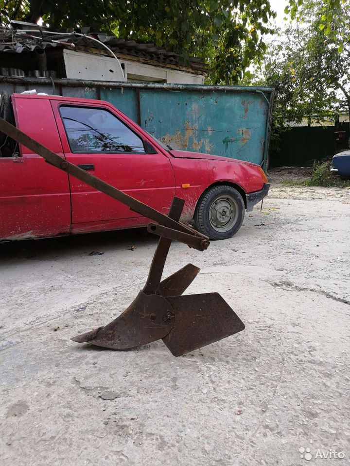 Плуг окучник